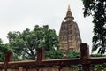 Mahabodhi Temple that view from the area near Buddha Bodhi Tree while raining at Bodh Gaya, Bihar, India.