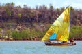 Small dhow with patchwork sail