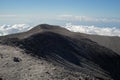 Mahameru peak above Mount Semeru, where the terrain is just sand and cloudscape Royalty Free Stock Photo
