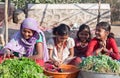 Indian girls selling vegetables
