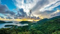 Mahe Island coast high resolution drone panorama during sunset, with dramatic sky, Seychelles.