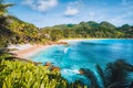 Mahe Island, Seychelles. Beautiful exotic Anse intendance tropical beach. Ocean wave rolling towards sandy beach with Royalty Free Stock Photo