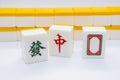 Tiles for mahjong. red, white, green.