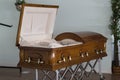 Mahogany casket in a funeral home