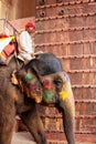 Mahout on decorated elephant entering Suraj Pol Sun Gate to Ja