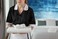 Maid changing towels