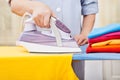 Maid ironing clothes Royalty Free Stock Photo