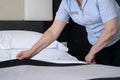 Maid Making Bed