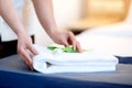 The maid puts a towel in a hotel room Royalty Free Stock Photo