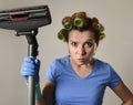 Maid service woman or upset housewife in hair rollers cleaning g