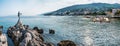 The Maiden with the Seagull. The statue is the symbol of  Opatij, Croatia. Beautiful panoramic view of Opatija town Royalty Free Stock Photo