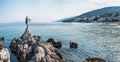 The Maiden with the Seagull. The statue is the symbol of  Opatij, Croatia. Beautiful panoramic view of Opatija town Royalty Free Stock Photo