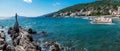 The Maiden with the Seagull. The statue is the symbol of Opatij, Croatia. Beautiful panoramic view of sea and sky Royalty Free Stock Photo