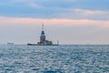 Maiden Tower in Istanbu at sunset. Fiery sunset over Bosphorus with famous Maiden`s Tower also known as Leander`s Tower