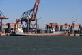 Maike D loading and unloading containers in the Maasvlakte harbor in the Port of Rotterdam