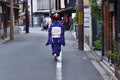 Maiko girl on the way of Gion alley, Kyoto Japan. Royalty Free Stock Photo