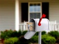 Mail Box in Front of a House Royalty Free Stock Photo