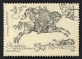 Mail delivery by horse in the old days. Post stamp printed in USSR about post