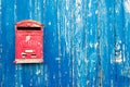 Mailbox in a blue door