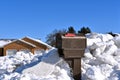 Mailbox buried in the deep chucks of snow