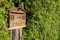 Mailbox in Bush Fence