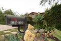 Mailbox in front of a house.