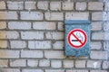 Mailbox on the gray brick wall, sticker no Smoking Royalty Free Stock Photo