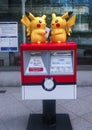 Mailbox of the Japanese Post with a statue of the character Pikachu