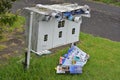 mailbox with junk mail sticking out