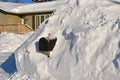 Mailbox buried in the deep snow