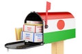 Mailbox with Niger flag with parcels, envelopes inside. Shipping in Niger, concept. 3D rendering Royalty Free Stock Photo