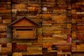 A mailbox on an old stone wall, Old wooden mailbox. Royalty Free Stock Photo