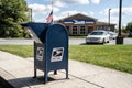 Mailbox sits in front of United States Post Office