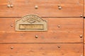 Mailbox on a Wooden Exterior Door