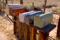 Mailboxes aged vintage in west California desert Royalty Free Stock Photo