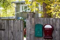 Mailboxes on the fence of a private house in the countryside Royalty Free Stock Photo