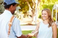 Mailman Delivering Letters To Woman Royalty Free Stock Photo