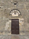 Main access door of the Pieve di San Giovanni. Campiglia Marittima, Tuscany Italy