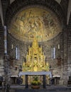 Main altar with mosaic apse in the Basilica of Saint James in Bellagio, Italy.