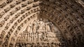 The main arch on the west facade of Notre Dame Cathedral, Paris, France Royalty Free Stock Photo