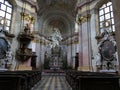 Main baroque altar and rich decorated side altars in Church Of Saint Petar and Paul.