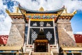 Main building front view of Baiji or one hundred chicken Tibetan Buddhist temple Shangri-La Yunnan China Royalty Free Stock Photo