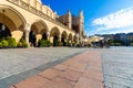 The main building in the market square in the Old Town of Krakow from a low angle - empty of people in the early morning Royalty Free Stock Photo