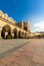 The main building in the market square in the Old Town of Krakow from a low angle - empty of people in the early morning Royalty Free Stock Photo