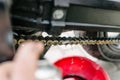 Main cleans motorbike chain