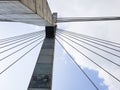 Bridge tower concrete columns with cable stays; Urban city transportation architecture structure, viewed from below.