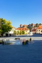 Main Dobo square in Eger Hungary with fountain statue and the castle fortress Royalty Free Stock Photo