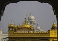 Main Dome of Golden Temple seen through Arch