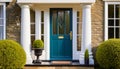 Main entrance door in house. Wooden front door with gabled porch and landing. Exterior of Georgian style home cottage with columns