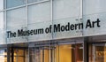 Main entrance with glass doors of the MoMA (Museum of Modern art) In Manhattan, New York